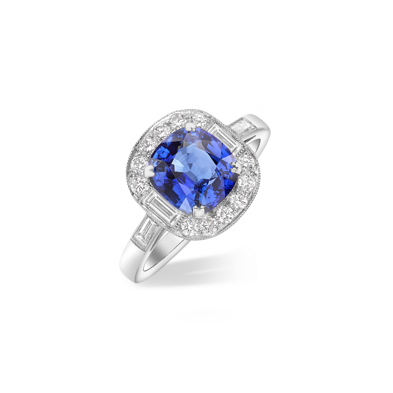 Vintage cushion cut sapphire and diamond cluster ring