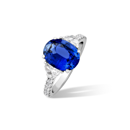 Oval sapphire and half moon diamond rings